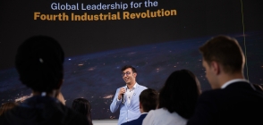 Thunderbird student speaks during an event in the global forum